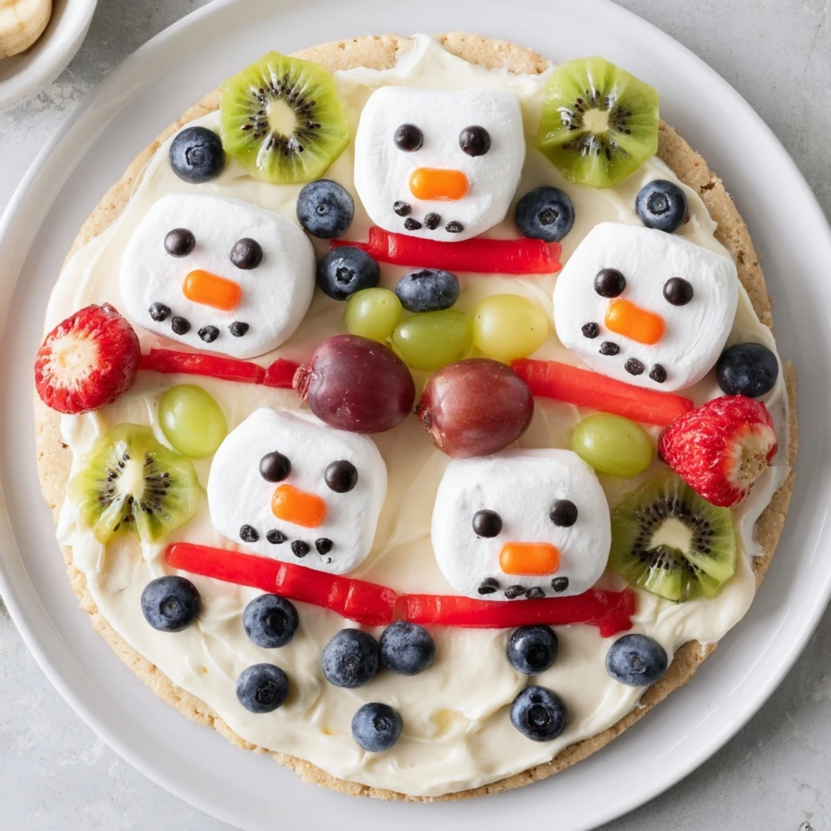 Here are the 3 ALT texts for the "Melting Snowman Fruit Pizza":