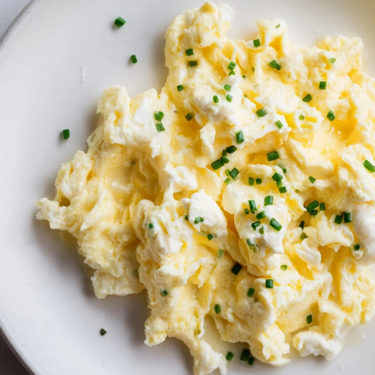 Picture this: fluffy Cottage Cheese Scrambled Eggs, seasoned and cooked to perfection for a light meal.