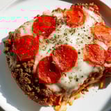 Mouthwatering low-carb Meat Pizza Pepperoni with bubbly cheese and a fragrant oregano aroma.
