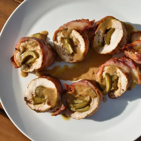 Tender Quick Chicken Rouladen Rolls, golden and seared, ready to serve with a rich gravy.