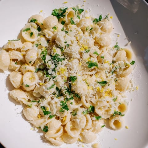 A bowl of creamy garlic butter ditalini pasta, ready to be enjoyed as a comforting dinner.