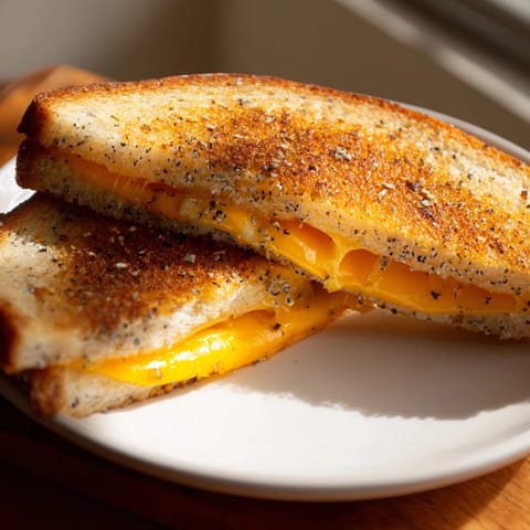 Crispy sourdough embraces the rich flavor in this garlic butter mayo grilled cheese.